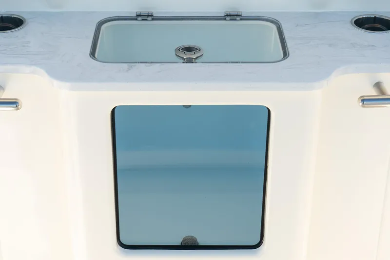 Slide: The Image of 2025 Scout 261 XSS boat sink with sleek design and modern fixtures. - 12
