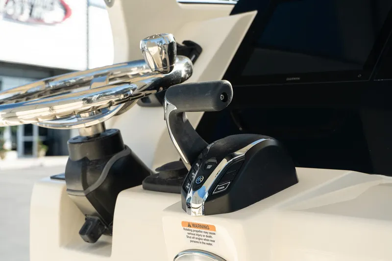 Slide: The Image of Close-up of 2025 Scout 261 XSS boat controls and steering wheel. - 16