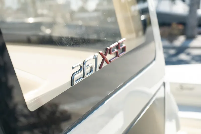 Slide: The Image of Close-up of 2025 Scout 261 XSS boat model emblem. - 18