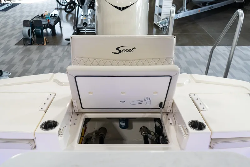 Slide: The Image of 2025 Scout 261 XSS boat interior with open storage compartment. - 41