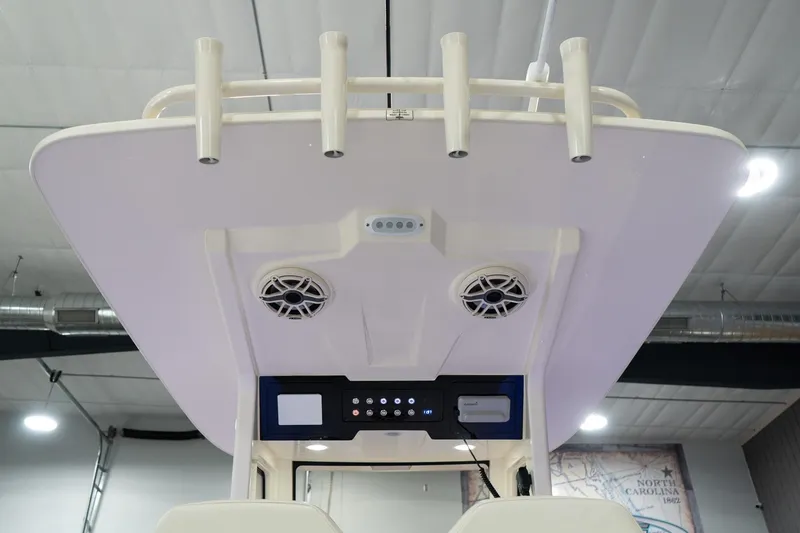 Slide: The Image of 2025 Scout 261 XSS boat interior with speakers and control panel. - 45