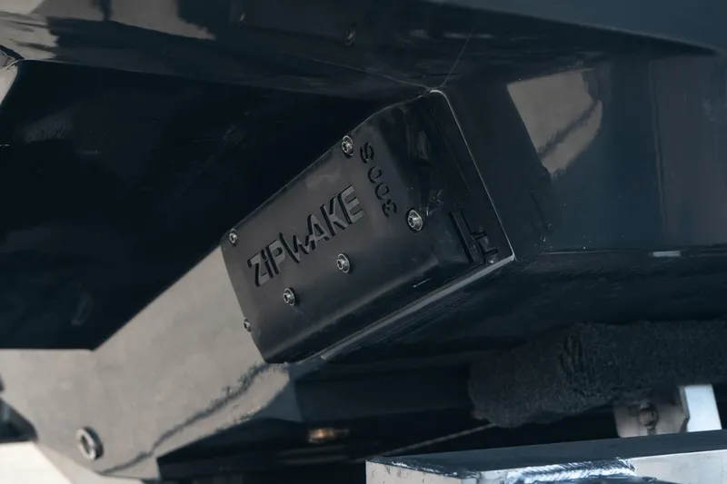 Slide: The Image of Close-up of 2025 Scout 261 XSS boat component with Zipwake system. - 8