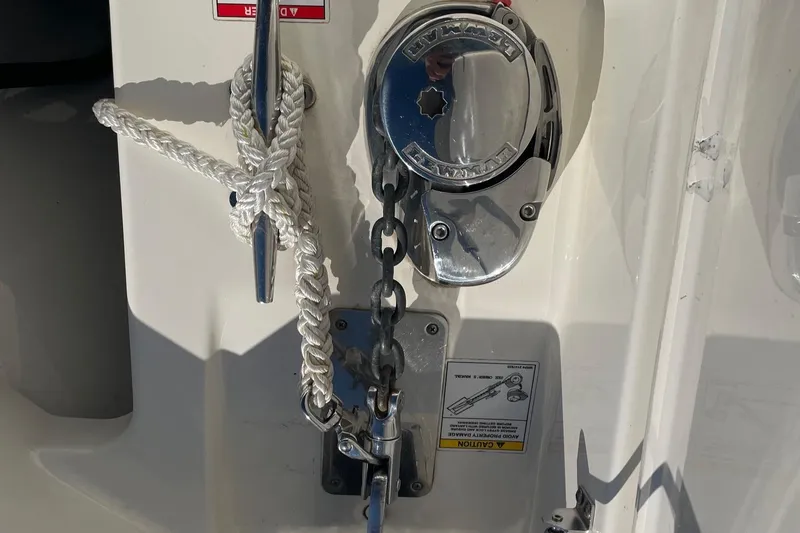 Slide: The Image of Close-up of 2021 Boston Whaler 240 Vantage boat anchor chain and cleat. - 11