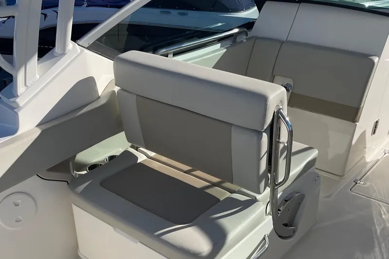 Slide: The Image of Boston Whaler 240 Vantage 2021 boat interior seating, featuring sleek design and comfortable upholstery. - 12