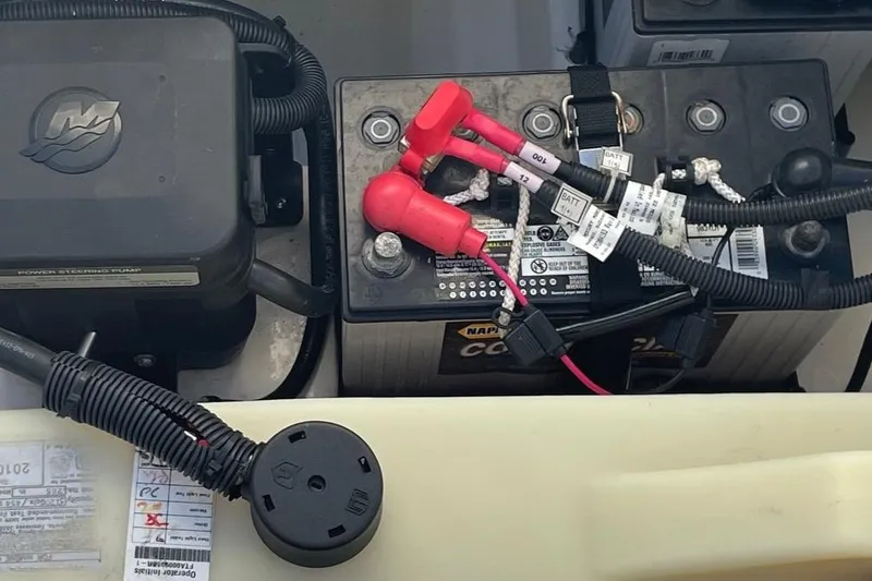 Slide: The Image of Battery compartment of a 2021 Boston Whaler 240 Vantage boat. - 14