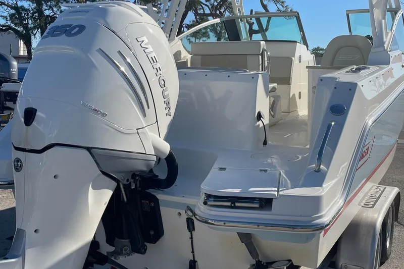 Slide: The Image of 2021 Boston Whaler 240 Vantage boat with Mercury 250 engine, rear view. - 4