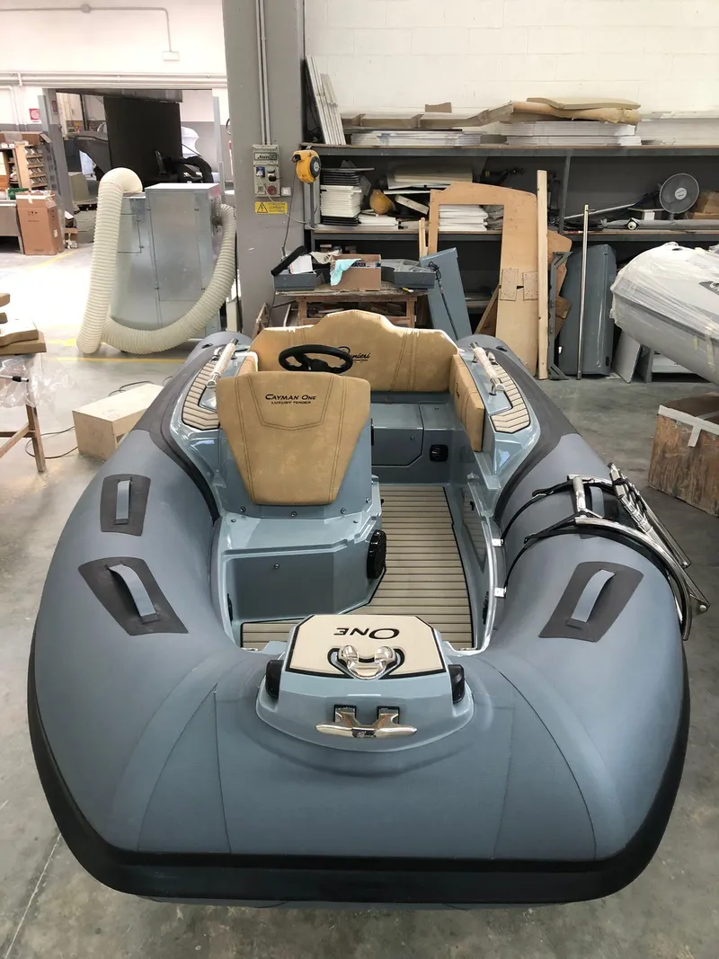 Slide: The Image of 2025 Ranieri CAYMAN ONE LUXURY TENDER in workshop, showcasing sleek design and premium materials. - 11