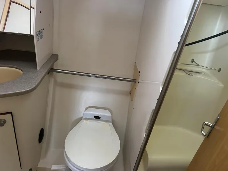 Slide: The Image of Compact bathroom in 2000 Hunter 410 yacht with toilet and shower. - 18