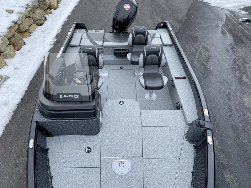 Slide: The Image of 2025 Lund 1775 Impact XS SS boat with sleek design and comfortable seating. - 11