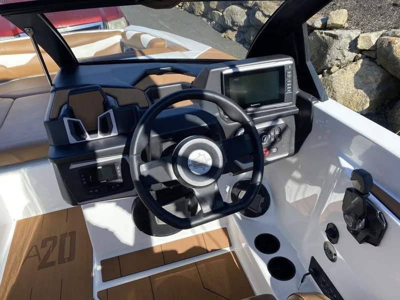 Slide: The Image of 2025 Axis A20 boat cockpit with modern steering and control panel. - 8