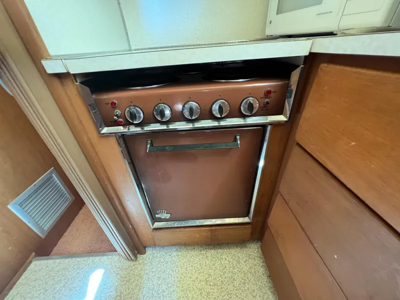 Slide: The Image of Vintage stove in 1967 Hatteras 41 Twin Cabin yacht kitchen. - 39