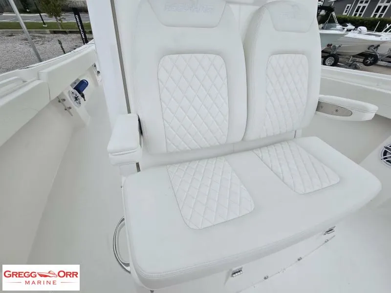 Slide: The Image of 2025 Regulator 31 boat with white quilted seating at Gregg Orr Marine. - 16