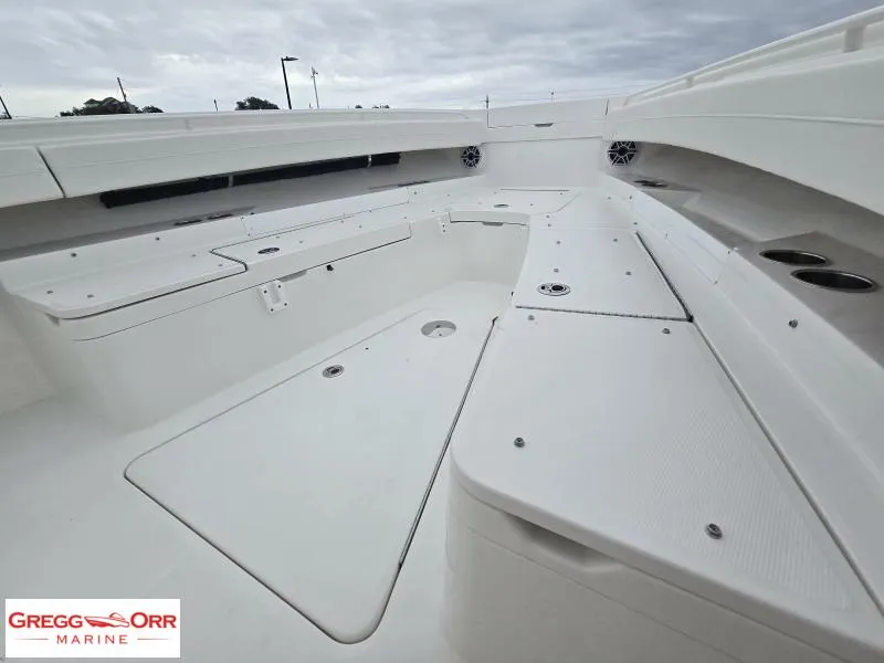 Slide: The Image of 2025 Regulator 31 boat interior with seating and storage compartments. - 17