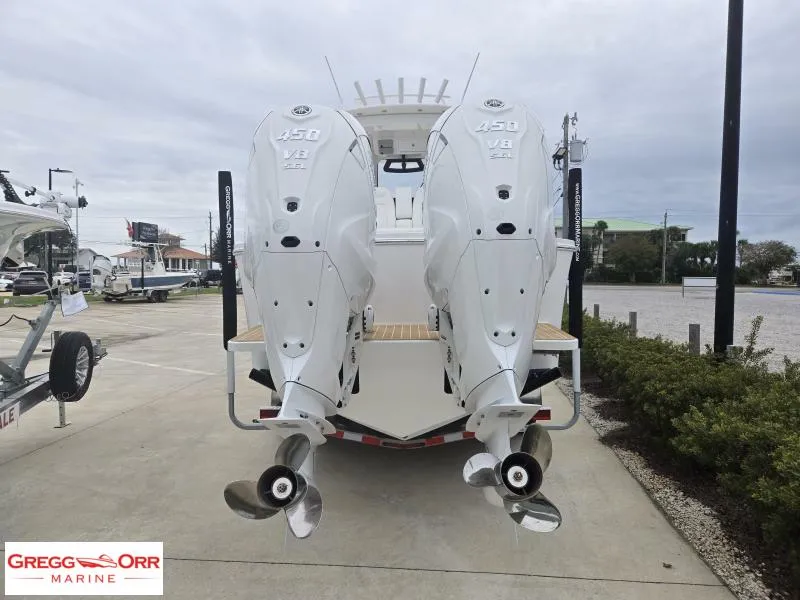 Slide: The Image of 2025 Regulator 31 boat with twin 450 V8 engines at Gregg Orr Marine. - 4