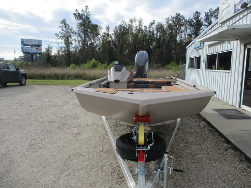 Slide: The Image of Avid Rogue 20 SC 2025 boat on trailer, parked outside dealership. - 3