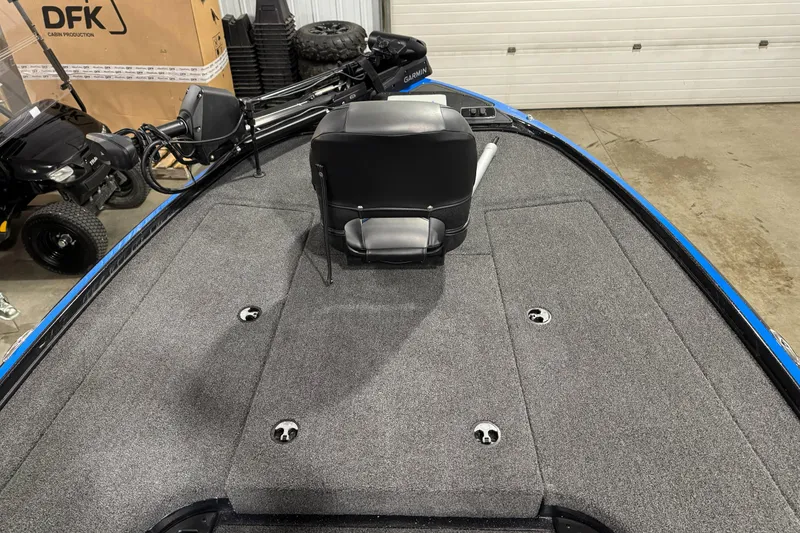 Slide: The Image of 2023 Nitro Z18 boat interior with gray carpet and black seat. - 7