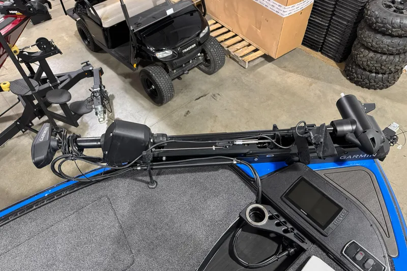 Slide: The Image of Nitro Z18 boat deck with Garmin equipment, 2023 model, in a garage setting. - 8