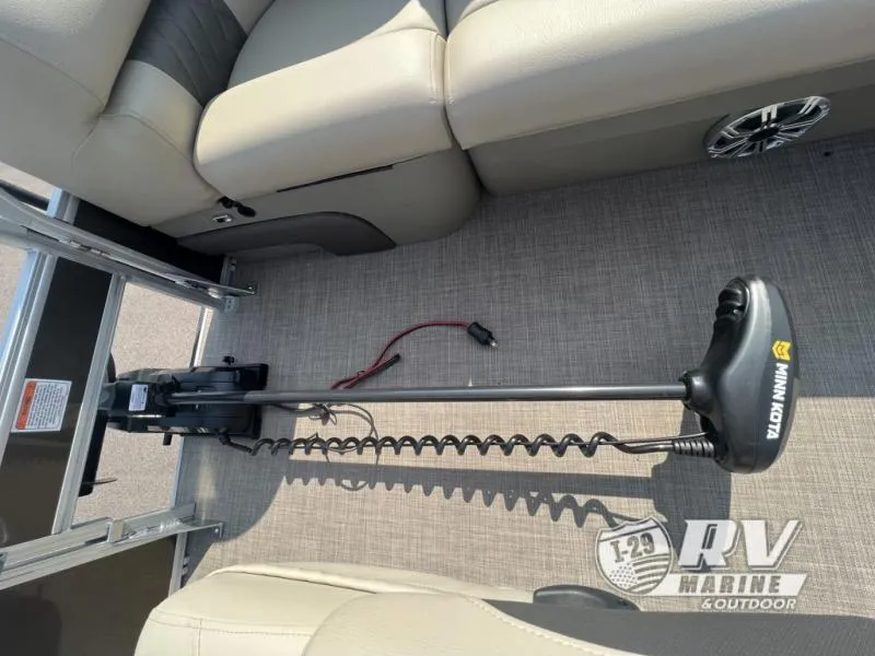 Slide: The Image of 2023 Sportfish 20 DLX boat interior with Minn Kota trolling motor on deck. - 19