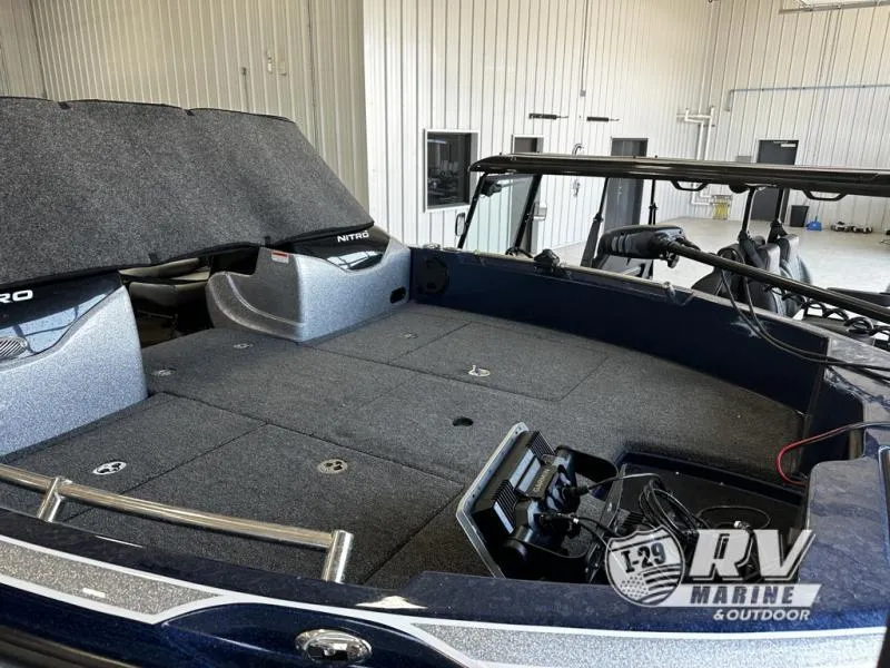 Slide: The Image of 2024 White River ZV19 boat interior with spacious deck and storage compartments. - 11
