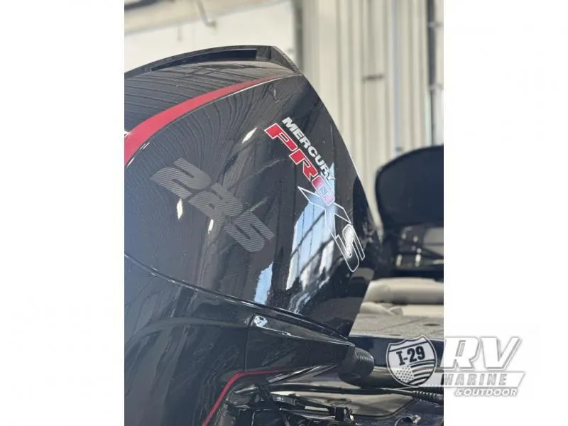 Slide: The Image of 2024 White River ZV19 with Mercury Pro XS 225 engine in a showroom. - 19