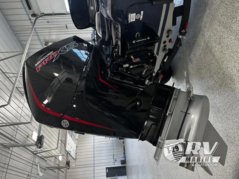 Slide: The Image of 2024 White River ZV19 with Mercury 425 outboard engine in a garage setting. - 8