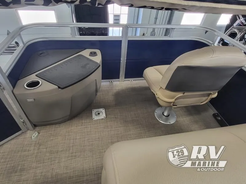 Slide: The Image of 2024 Fishin Barge FB20 interior with seating and console, RV Marine branding visible. - 9