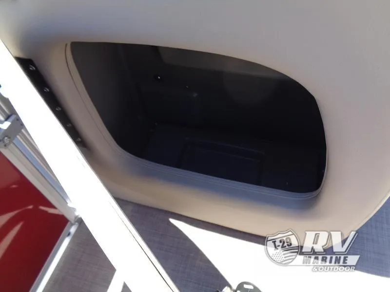 Slide: The Image of 2024 Party Barge 18DLX storage compartment, RV Marine logo visible. - 12