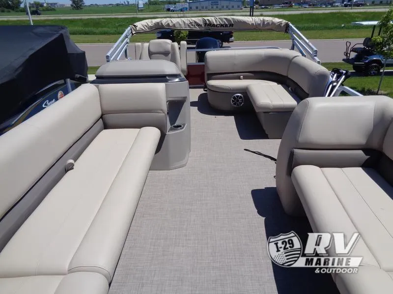 Slide: The Image of 2024 Party Barge 18DLX pontoon boat with spacious seating and modern design. - 16
