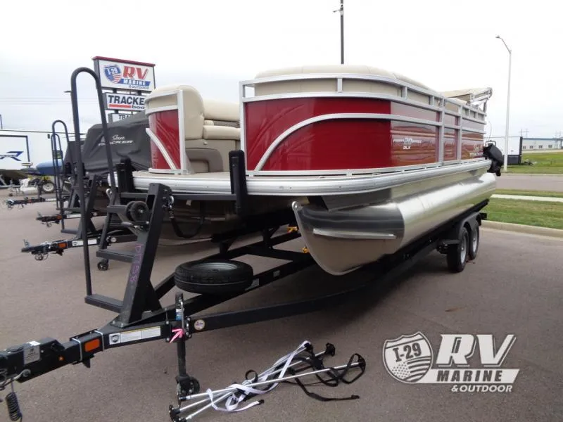Slide: The Image of 2024 Party Barge 20 pontoon boat on trailer at RV Marine dealership. - 12