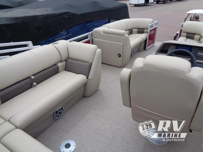 Slide: The Image of 2024 Party Barge 20 pontoon boat with beige seating and spacious deck. - 20