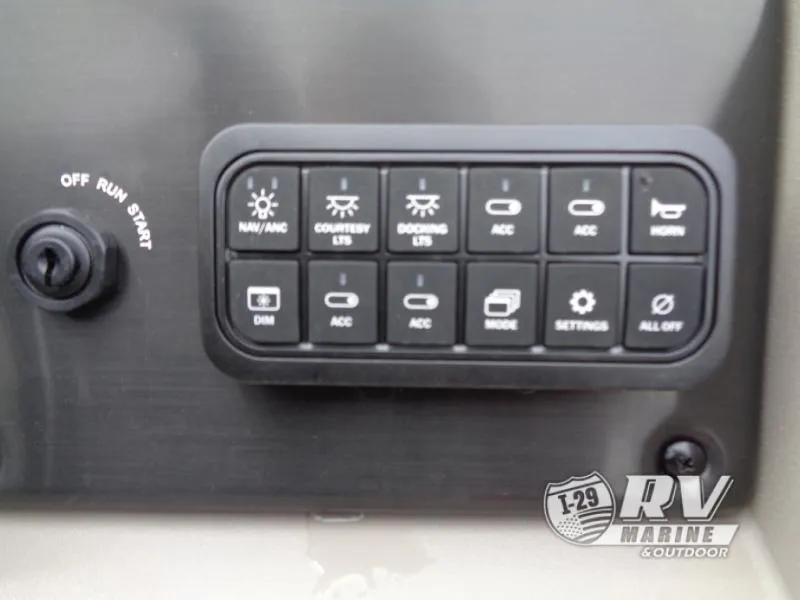 Slide: The Image of Control panel of 2024 Party Barge 20 with various switches and settings. - 3