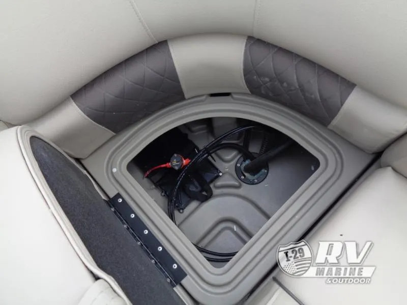 Slide: The Image of 2024 Party Barge 20 storage compartment with wiring, featuring quilted upholstery. - 5