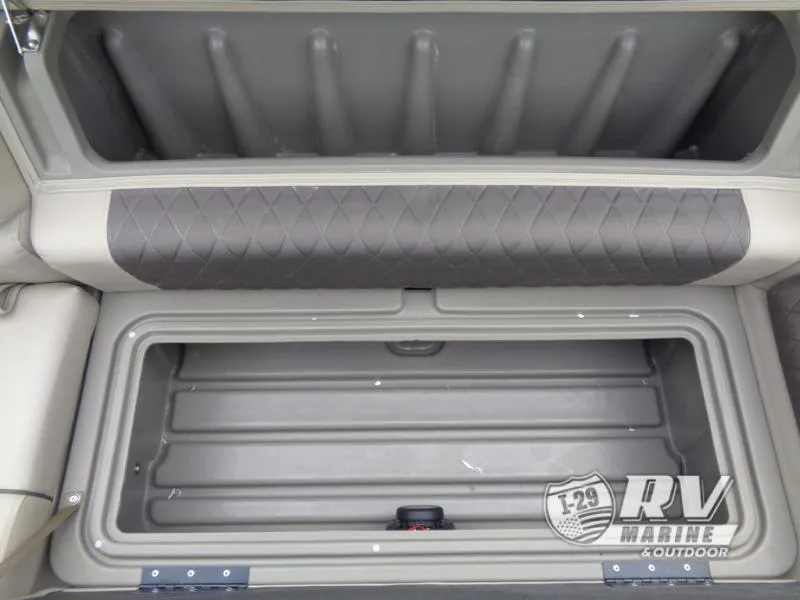 Slide: The Image of 2024 Party Barge 20 storage compartment with quilted seat cushion, RV Marine logo visible. - 6