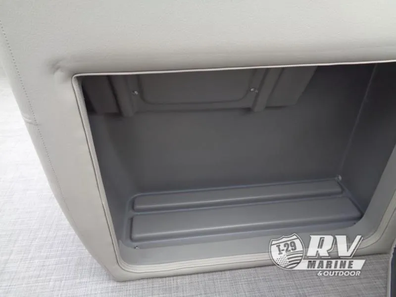 Slide: The Image of 2024 Party Barge 20 storage compartment, gray interior, RV Marine logo visible. - 7