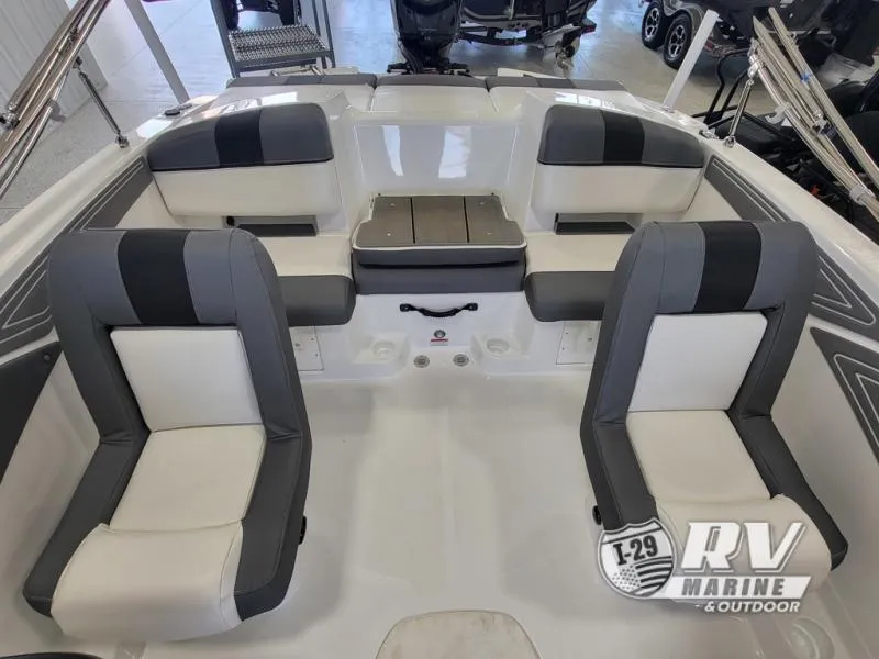 Slide: The Image of 2024 T21 Tahoe boat interior with gray and white seating, showcased at RV Marine. - 11
