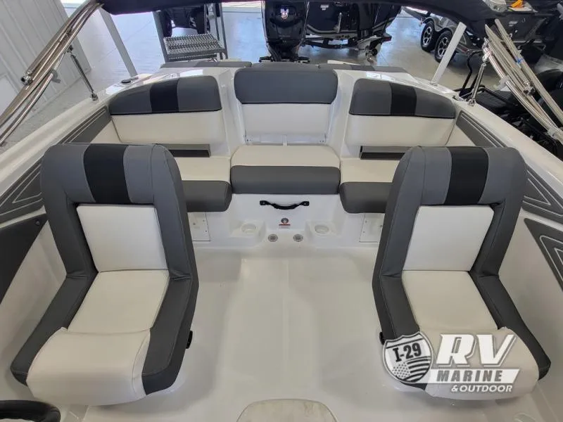 Slide: The Image of 2024 Tahoe T21 boat interior with gray and white seating, showcased at RV Marine. - 4
