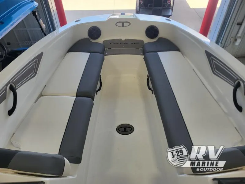 Slide: The Image of 2024 T21 Tahoe boat interior with gray and white seating, displayed at I-29 RV Marine. - 7