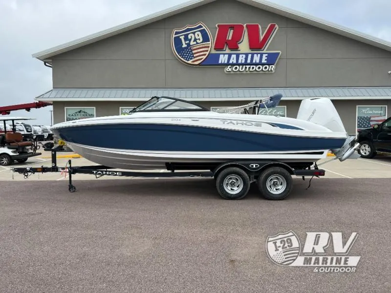 Slide: The Image of 2024 Tahoe 210S boat on trailer at RV Marine & Outdoor dealership. - 1
