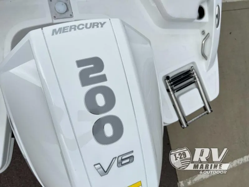 Slide: The Image of Mercury 200 V6 engine on 2024 Tahoe 210S boat, with RV Marine logo. - 5