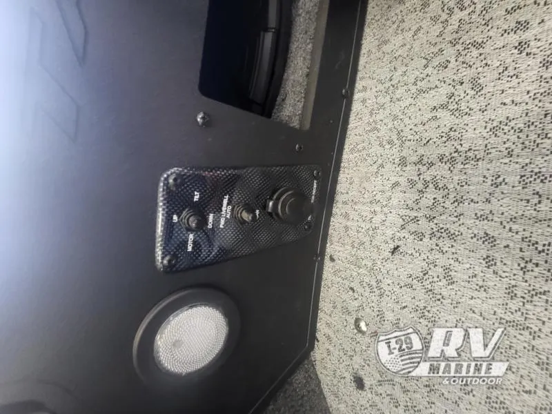 Slide: The Image of Control panel of 2024 Targa V19 boat with switches and speaker. - 12