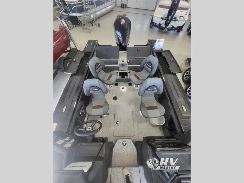 Slide: The Image of 2024 Targa V19 boat interior with four seats and modern design in showroom. - 4