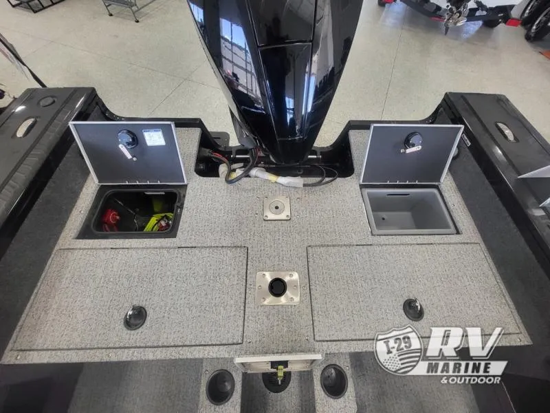 Slide: The Image of 2024 Targa V19 boat interior with storage compartments and motor, displayed at RV Marine & Outdoor. - 7
