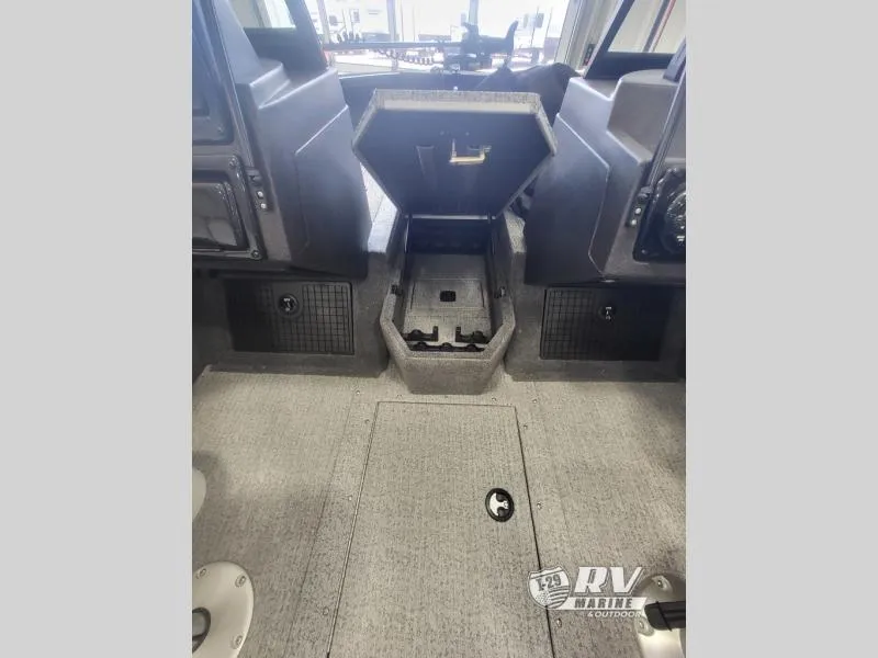 Slide: The Image of 2024 Targa V19 boat interior with open storage compartment and carpeted flooring. - 9