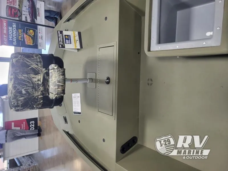 Slide: The Image of 2024 Tracker 1754SC boat interior with camo seat at RV Marine showroom. - 7