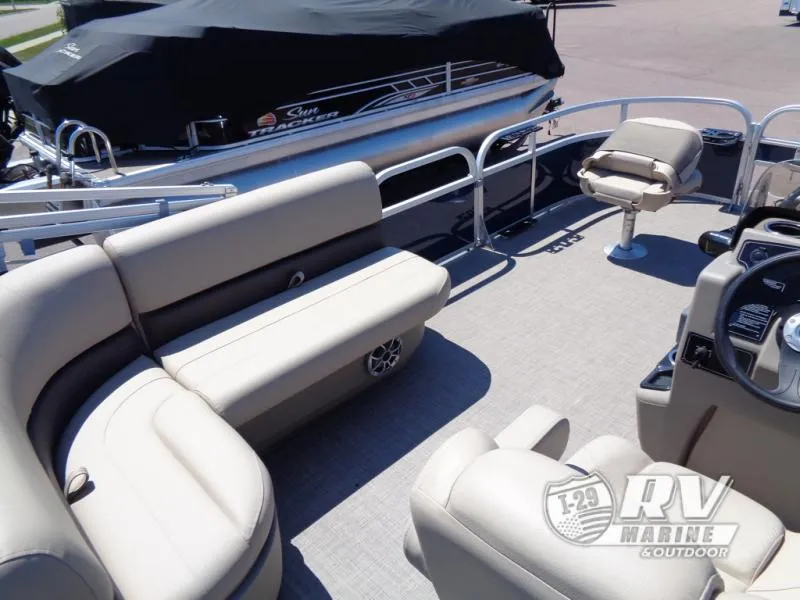 Slide: The Image of 2025 BASS BUGGY 16 XL Select pontoon boat interior with seating and steering console. - 15