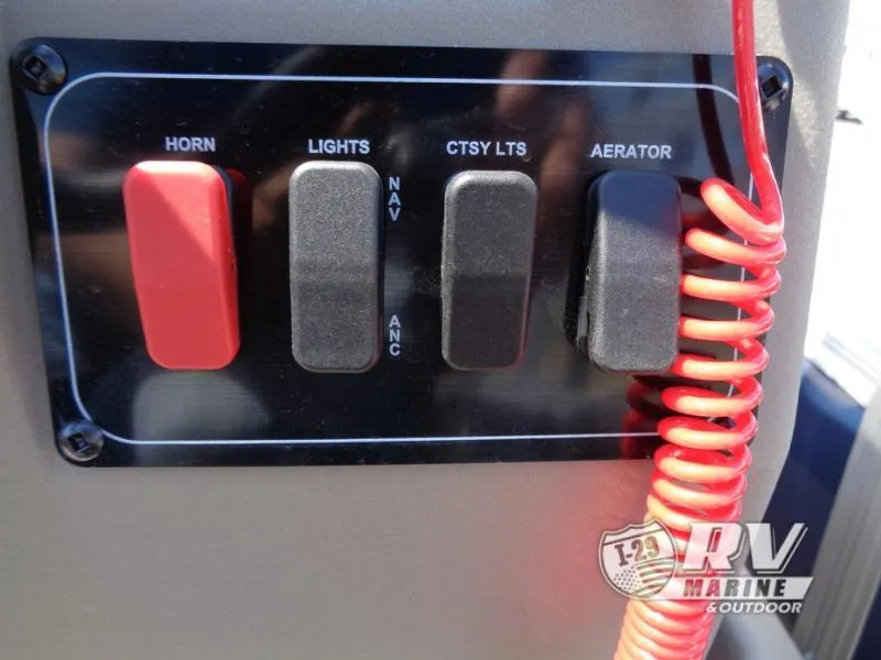 Slide: The Image of Control panel of 2025 BASS BUGGY 16 XL Select with switches for horn, lights, and aerator. - 3