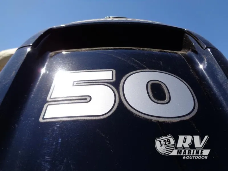 Slide: The Image of Close-up of a 50 horsepower engine on a 2025 BASS BUGGY 16 XL Select boat. - 9