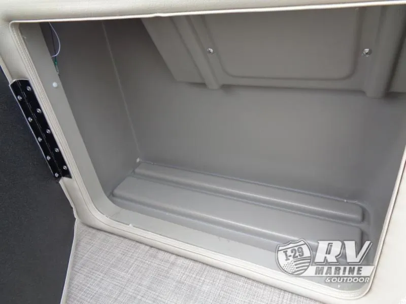 Slide: The Image of Storage compartment of 2025 Party Barge PB22XP3 pontoon boat, open and empty. - 10