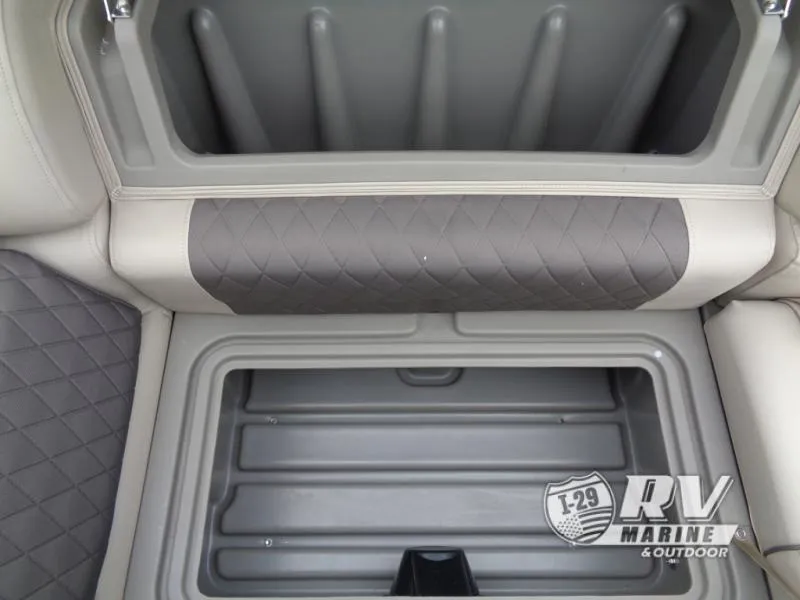Slide: The Image of 2025 Party Barge PB22XP3 storage compartment with quilted upholstery, showcased by RV Marine. - 14