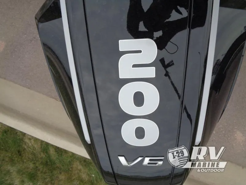 Slide: The Image of Close-up of a 200 V6 engine cover on a Party Barge PB22XP3, 2025 model. - 18